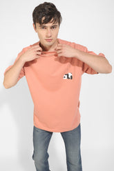 Snoozy Panda Peach Oversized Unisex T-Shirt By Purple Mango