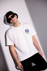 Under The Rains White Oversized Unisex T-shirt By Purple Mango